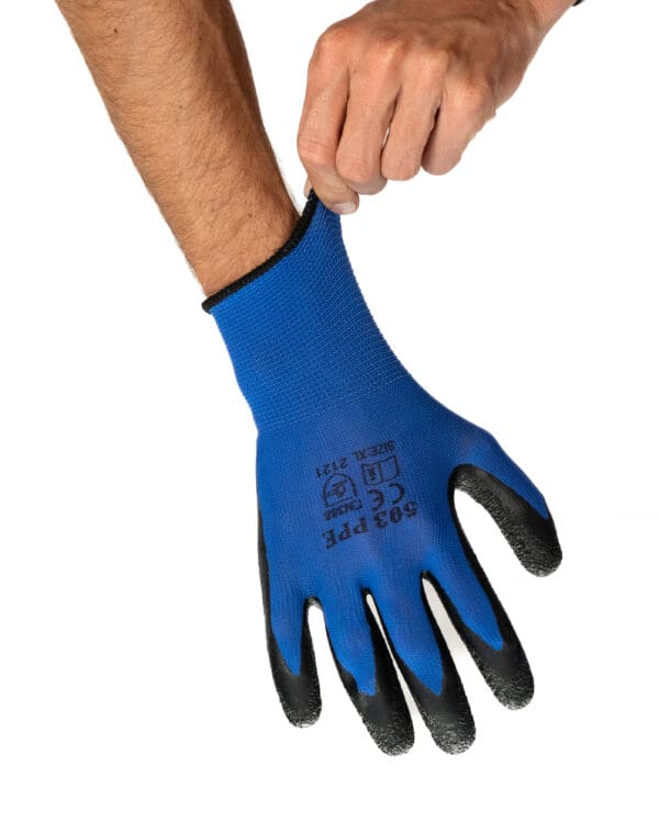 someone putting on a 503 PPE General Purpose Textured Latex Coated Gloves against a white background