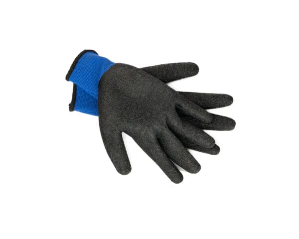 a pair of 503 PPE General Purpose Textured Latex Coated Gloves resting, black textured side up on a white table